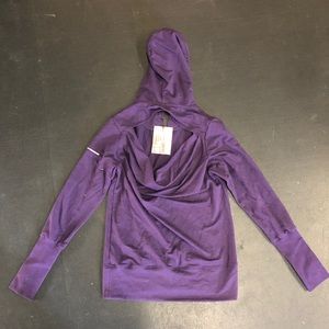 NEW. Born Primitive purple, open back, pullover!
